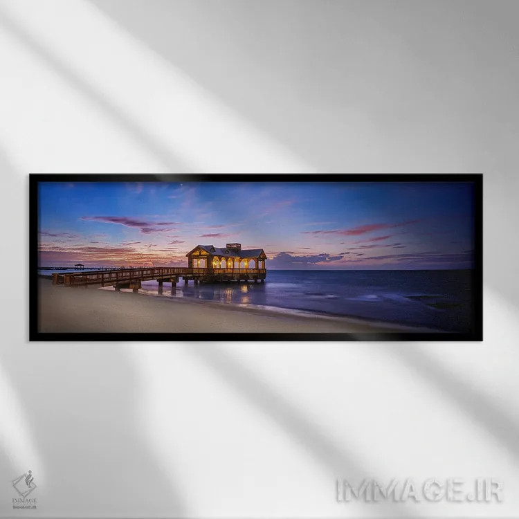 تابلو دکوراتیو اسکله ساعت آبی کی وست اثر سوزانه کرمر - نمای قابدار مشکی