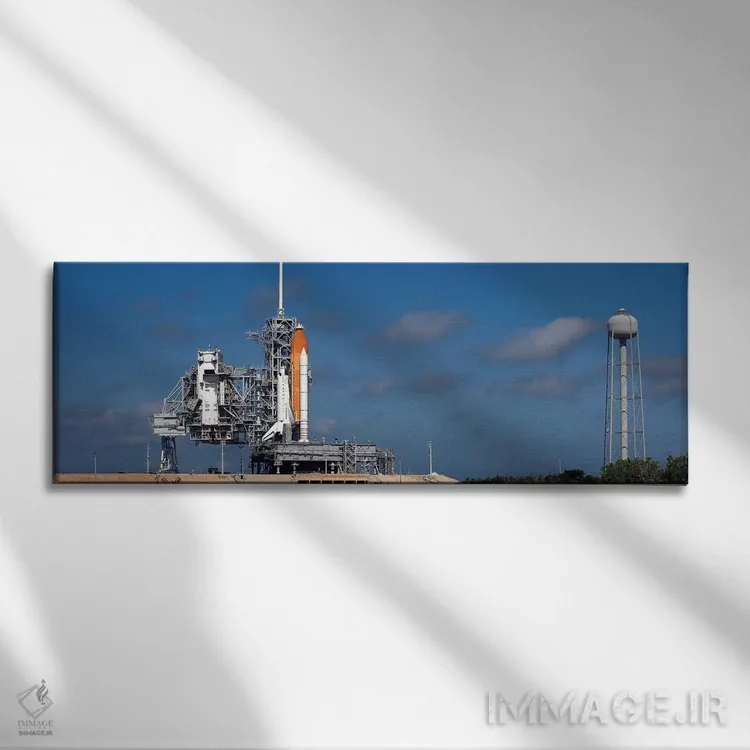 تابلو دکوراتیو فضاپیمای دیسکاوری آماده بر روی سکوی پرتاب مرکز فضایی ک… اثر استاک ترک ایمیجز - نمای روبهرو روی دیوار