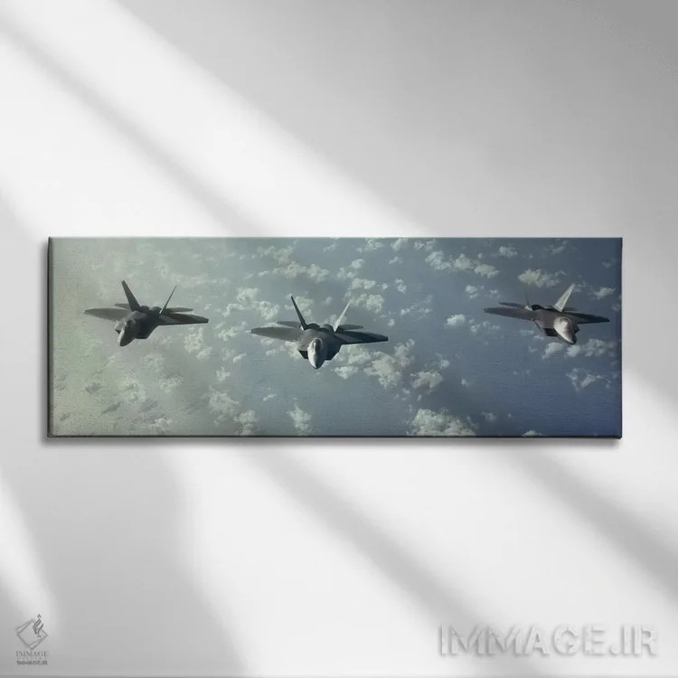 تابلو دکوراتیو آرایش پروازی سه فروند F-22 رپتور بر فراز اقیانوس آرام اثر استاک ترک ایمیجز - نمای روبهرو روی دیوار