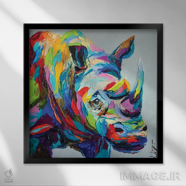 تابلو دکوراتیو کرگدن رنگارنگ اثر کوپتسووا آرت - نمای قابدار مشکی