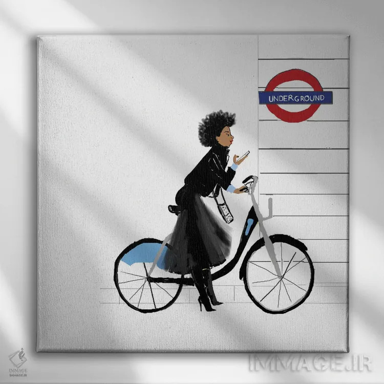 تابلو دکوراتیو دختر دوچرخه سوار اثر نیکل کوبی - نمای روبهرو روی دیوار