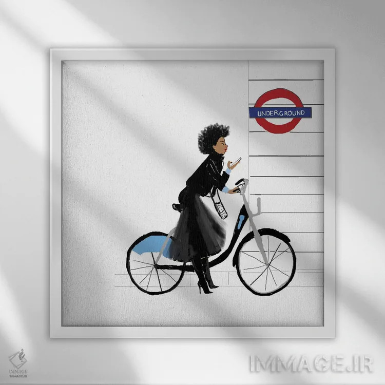 تابلو دکوراتیو دختر دوچرخه سوار اثر نیکل کوبی - نمای قابدار سفید