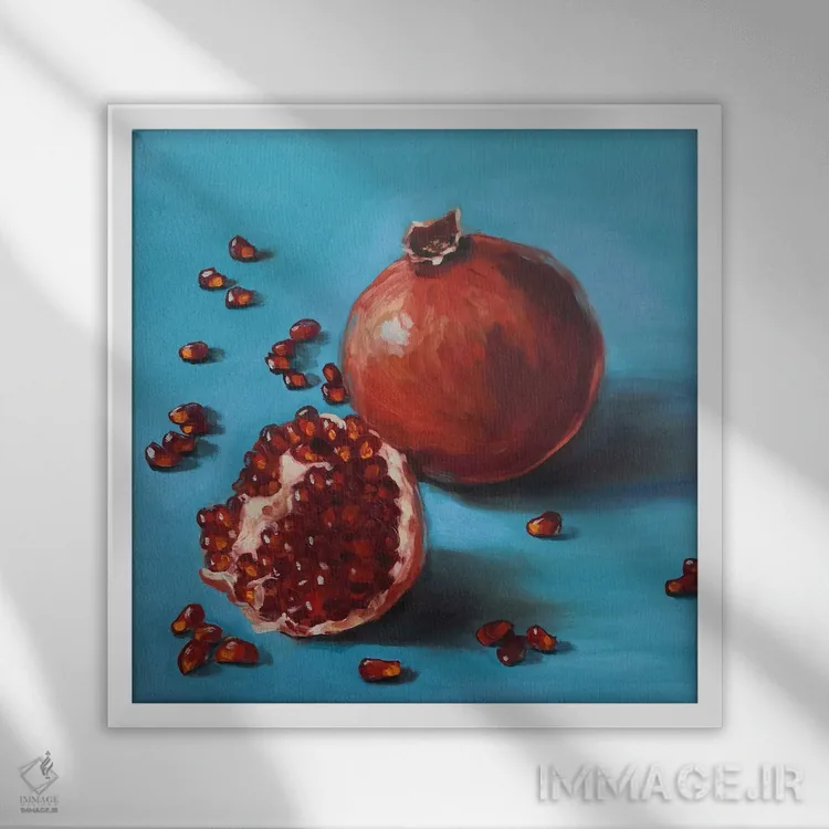 تابلو دکوراتیو انارهای رسیده و دانه ها اثر جین لانتسمن - نمای قابدار سفید