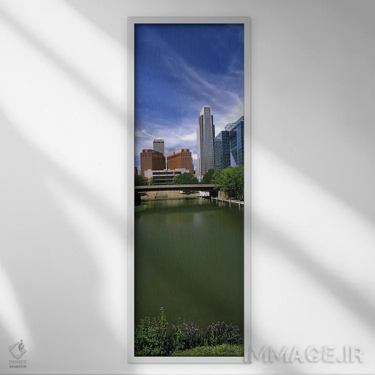 تابلو دکوراتیو ساختمان ها در کنار آب، اوماها، نبراسکا، ایالات متحده آم… اثر پانورامیک ایمجز - نمای قابدار سفید