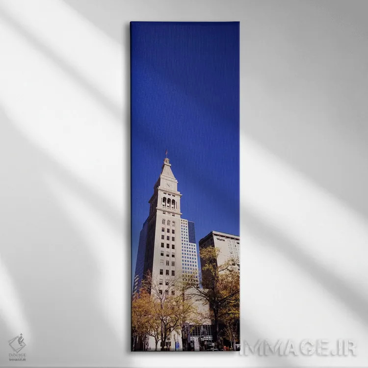 تابلو دکوراتیو نمای پایین از یک برج ساعت، دنور، کلرادو، ایالات متحده آ… اثر پانورامیک ایمجز - نمای روبهرو روی دیوار