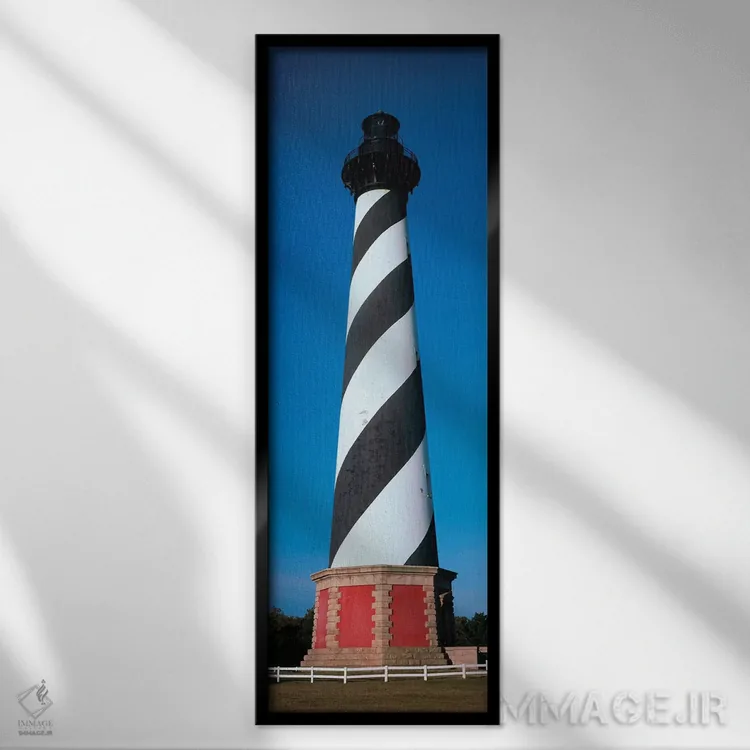 تابلو دکوراتیو "فانوس دریایی کپه هاتراس، جزیره هاتراس، اوتر بنکز، باکس… اثر پانورامیک ایمجز - نمای قابدار مشکی