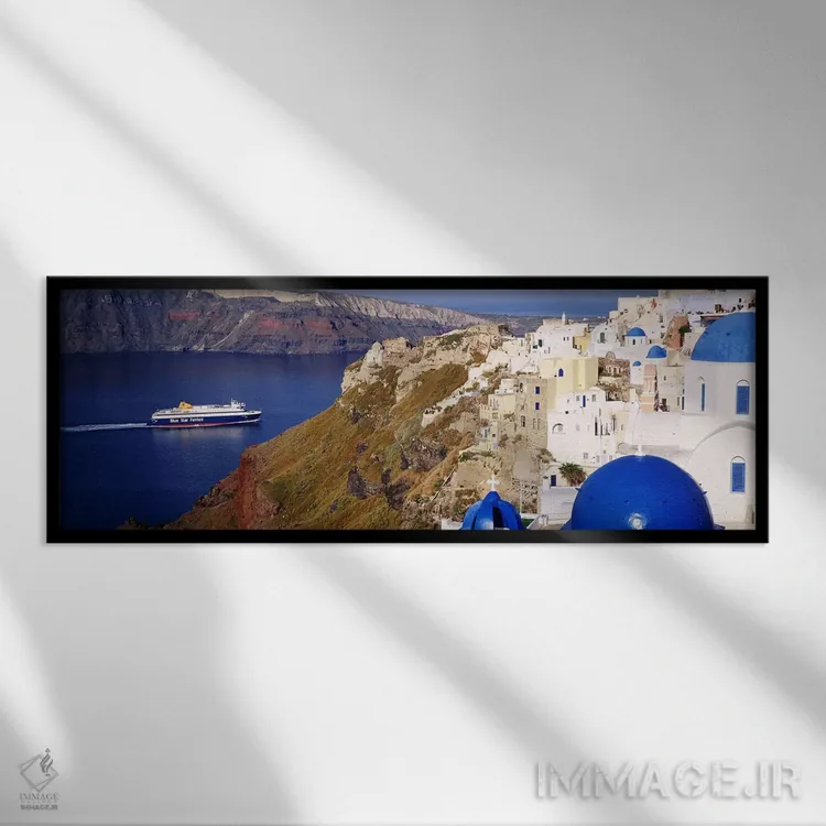 تابلو دکوراتیو Santorini, Cyclades Islands, Greece,ساختمان ها در دره… اثر پانورامیک ایمجز - نمای قابدار مشکی