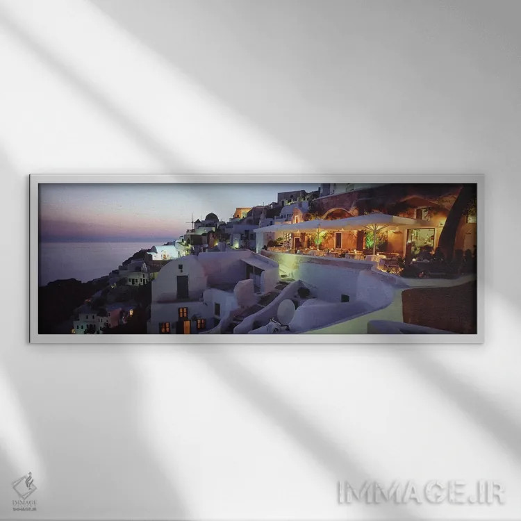 تابلو دکوراتیو Santorini, Cyclades, Greece,منظره روستایی ساحلی در شامگ… اثر پانورامیک ایمجز - نمای قابدار سفید