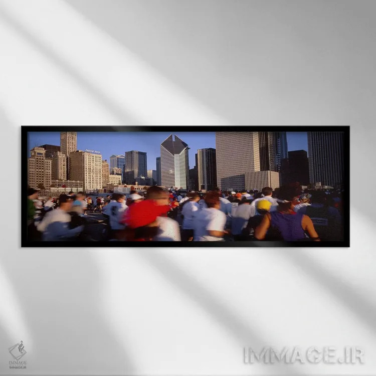 تابلو دکوراتیو Chicago, Illinois, USA,گروهی از افراد در حال دویدن در م… اثر پانورامیک ایمجز - نمای قابدار مشکی