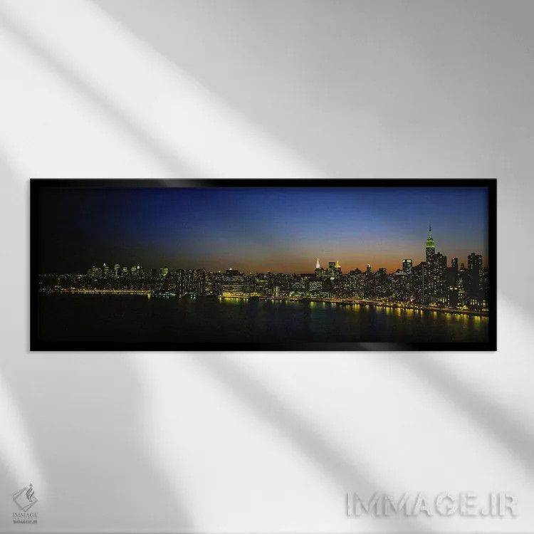 تابلو دکوراتیو New York City, New York, USA,منظره شهری روشن شده، نیویو… اثر پانورامیک ایمجز - نمای قابدار مشکی