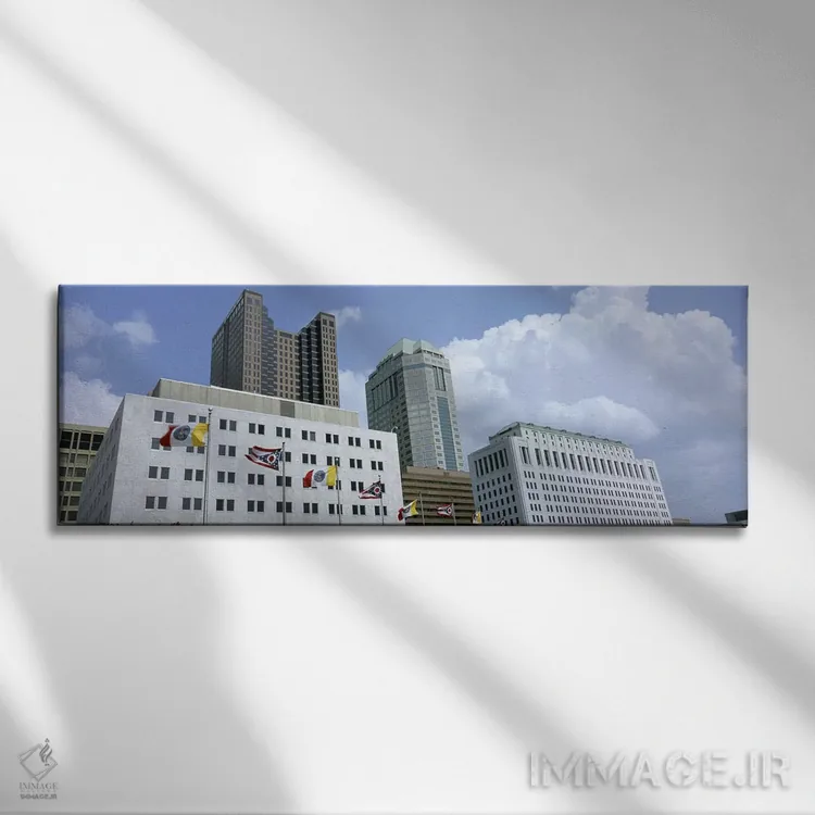 تابلو دکوراتیو Ohio, Columbus, Cloud over tall building structures #2… اثر پانورامیک ایمجز - نمای روبهرو روی دیوار
