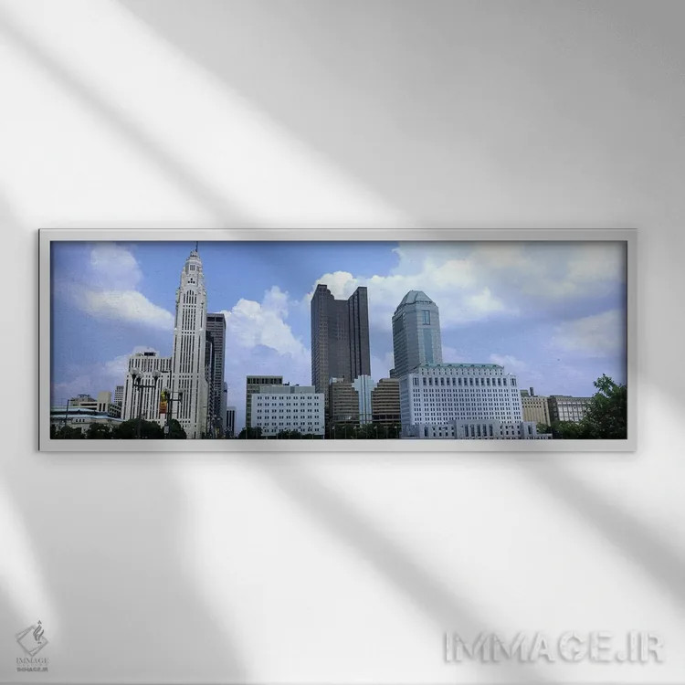تابلو دکوراتیو Ohio, Columbus, Clouds over tall building structures,او… اثر پانورامیک ایمجز - نمای قابدار سفید