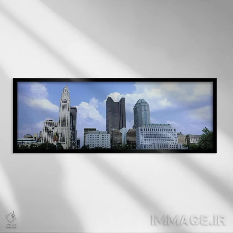 تابلو دکوراتیو Ohio, Columbus, Clouds over tall building structures,او… اثر پانورامیک ایمجز - نمای قابدار مشکی