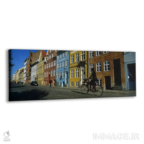تابلو دکوراتیو Copenhagen, Denmark,زنی در حال دوچرخه سواری، کپنهاگ، دا… اثر پانورامیک ایمجز - نمای پرسپکتیو محصول