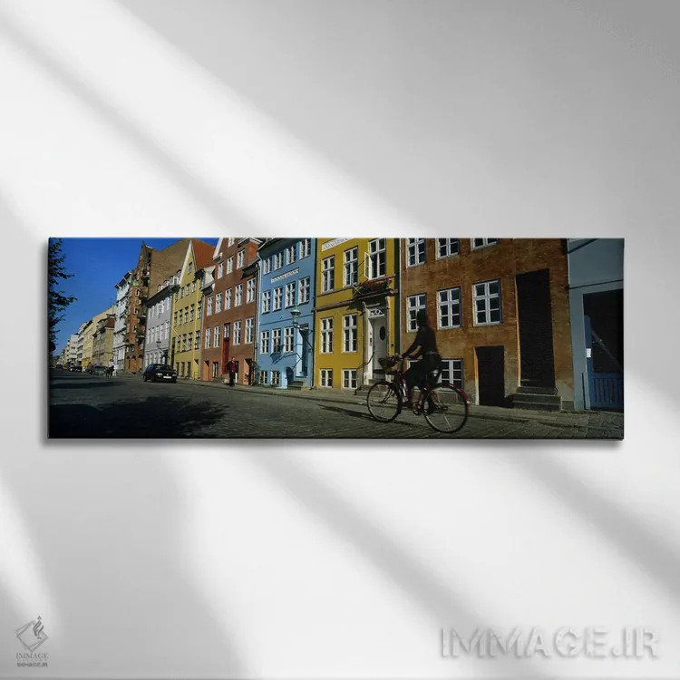 تابلو دکوراتیو Copenhagen, Denmark,زنی در حال دوچرخه سواری، کپنهاگ، دا… اثر پانورامیک ایمجز - نمای روبهرو روی دیوار