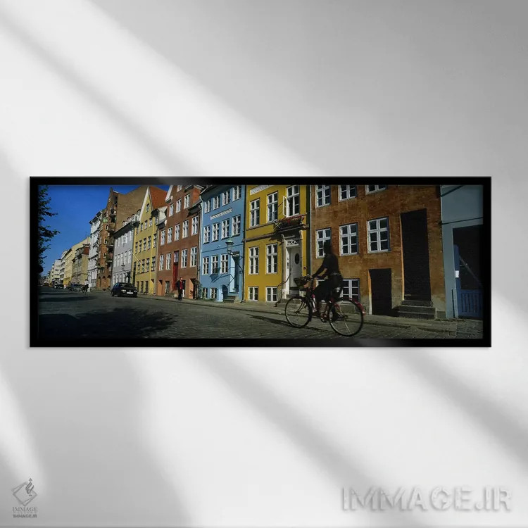 تابلو دکوراتیو Copenhagen, Denmark,زنی در حال دوچرخه سواری، کپنهاگ، دا… اثر پانورامیک ایمجز - نمای قابدار مشکی