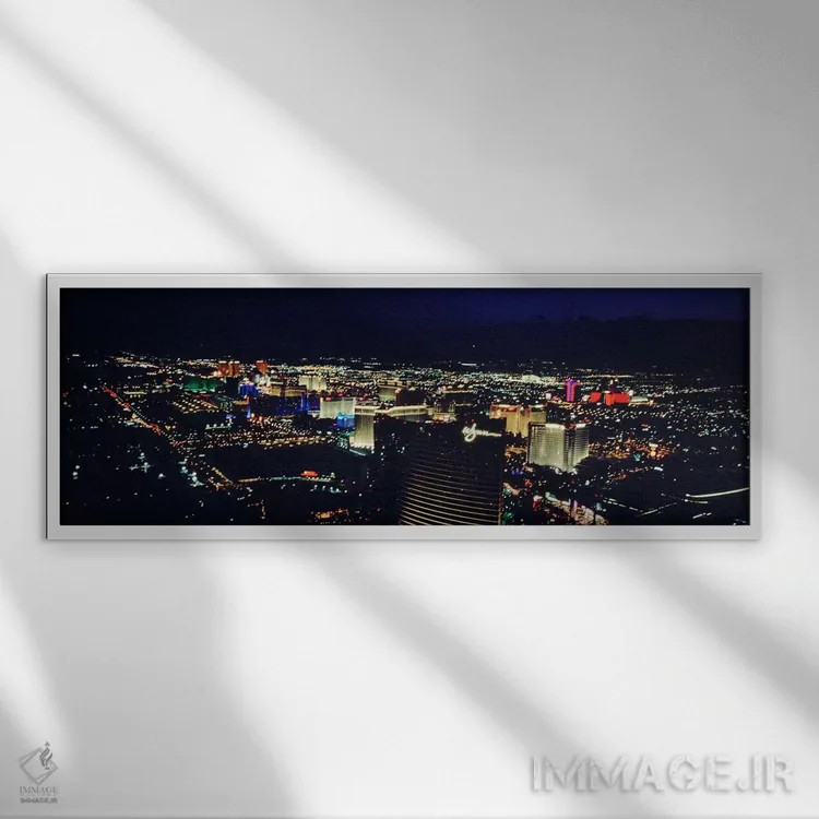 تابلو دکوراتیو The Strip, Las Vegas, Nevada, USA,نمای بالا از شهری روش… اثر پانورامیک ایمجز - نمای قابدار سفید