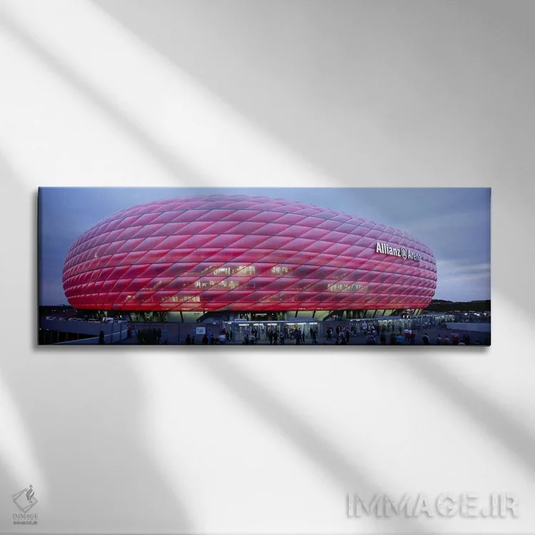 تابلو دکوراتیو Allianz Arena, Munich, Germany,ورزشگاه فوتبال روشن در غ… اثر پانورامیک ایمجز - نمای روبهرو روی دیوار