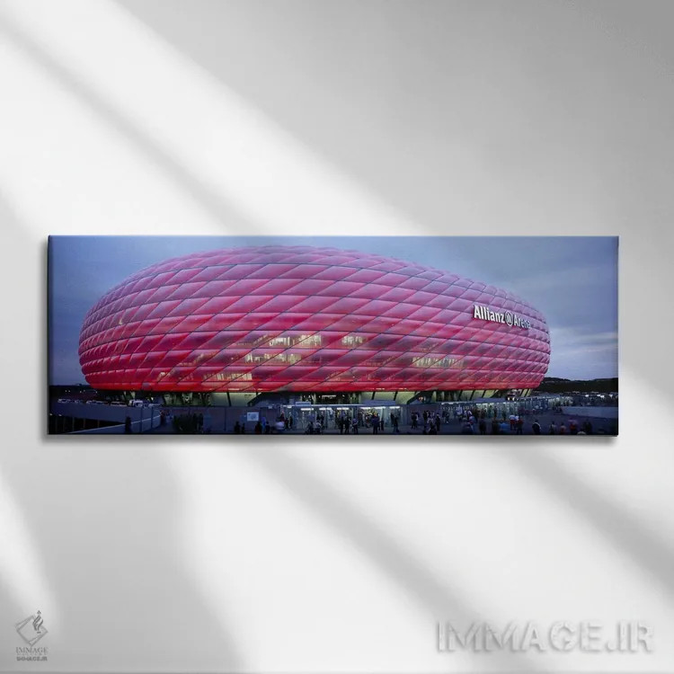 تابلو دکوراتیو Allianz Arena, Munich, Germany,ورزشگاه فوتبال روشن در غ… اثر پانورامیک ایمجز - نمای روبهرو روی دیوار