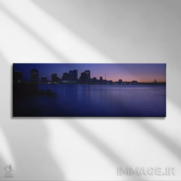 تابلو دکوراتیو New Orleans, Louisiana, USA,ساختمان ها کنار آب، نیواورل… اثر پانورامیک ایمجز - نمای روبهرو روی دیوار