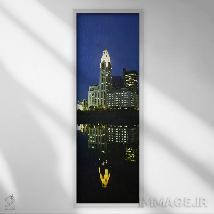 تابلو دکوراتیو Scioto River, Columbus, Ohio, USA,ساختمان های روشن شهر… اثر پانورامیک ایمجز - نمای قابدار سفید