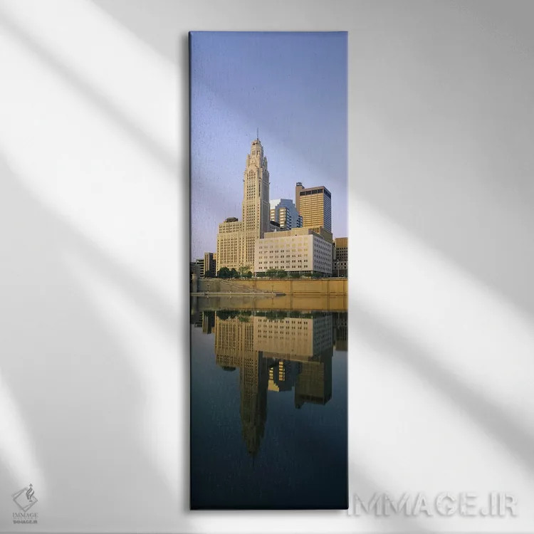 تابلو دکوراتیو Scioto River, Columbus, Ohio, USA,انعکاس ساختمان ها در… اثر پانورامیک ایمجز - نمای روبهرو روی دیوار