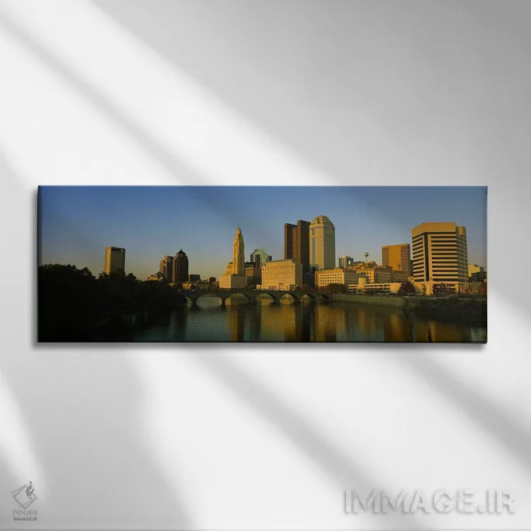 تابلو دکوراتیو Columbus, Ohio, USA,نمای بالا از ساختمان ها در کنار آب… اثر پانورامیک ایمجز - نمای روبهرو روی دیوار
