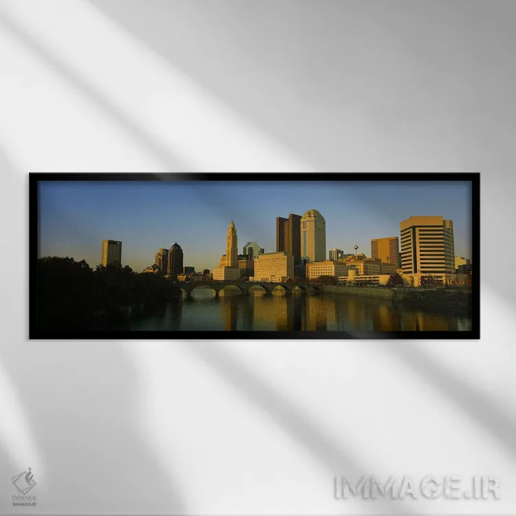تابلو دکوراتیو Columbus, Ohio, USA,نمای بالا از ساختمان ها در کنار آب… اثر پانورامیک ایمجز - نمای قابدار مشکی