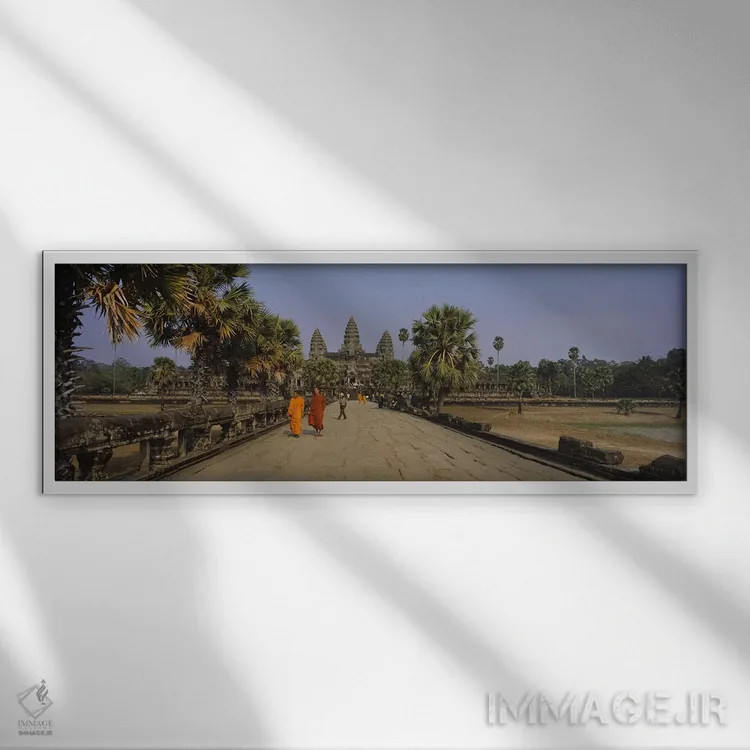 تابلو دکوراتیو Angkor Wat, Siem Reap, Cambodia,دو راهب در حال راه رفتن… اثر پانورامیک ایمجز - نمای قابدار سفید