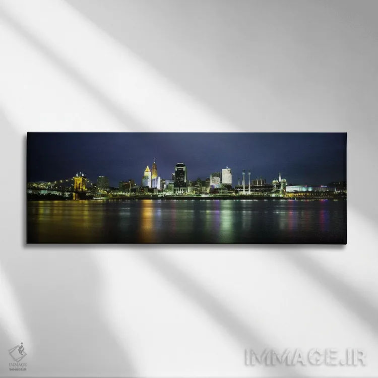 تابلو دکوراتیو lit up at nightOhio River, Cincinnati, Ohio, USA,ساختما… اثر پانورامیک ایمجز - نمای روبهرو روی دیوار