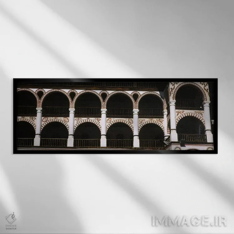 تابلو دکوراتیو Rila Monastery, Bulgaria,نمای زاویه پایین از یک صومعه… اثر پانورامیک ایمجز - نمای قابدار مشکی