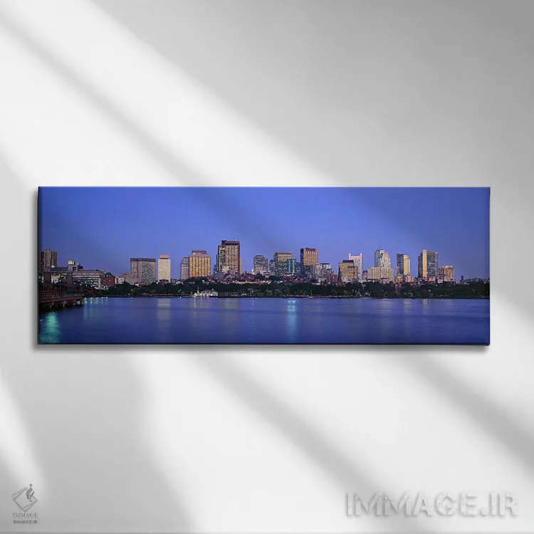 تابلو دکوراتیو Boston, Massachusetts, USA,ساختمان های حاشیه آب روشن در… اثر پانورامیک ایمجز - نمای روبهرو روی دیوار