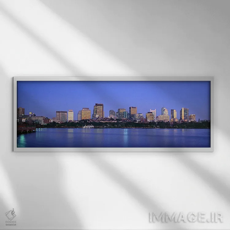تابلو دکوراتیو Boston, Massachusetts, USA,ساختمان های حاشیه آب روشن در… اثر پانورامیک ایمجز - نمای قابدار سفید