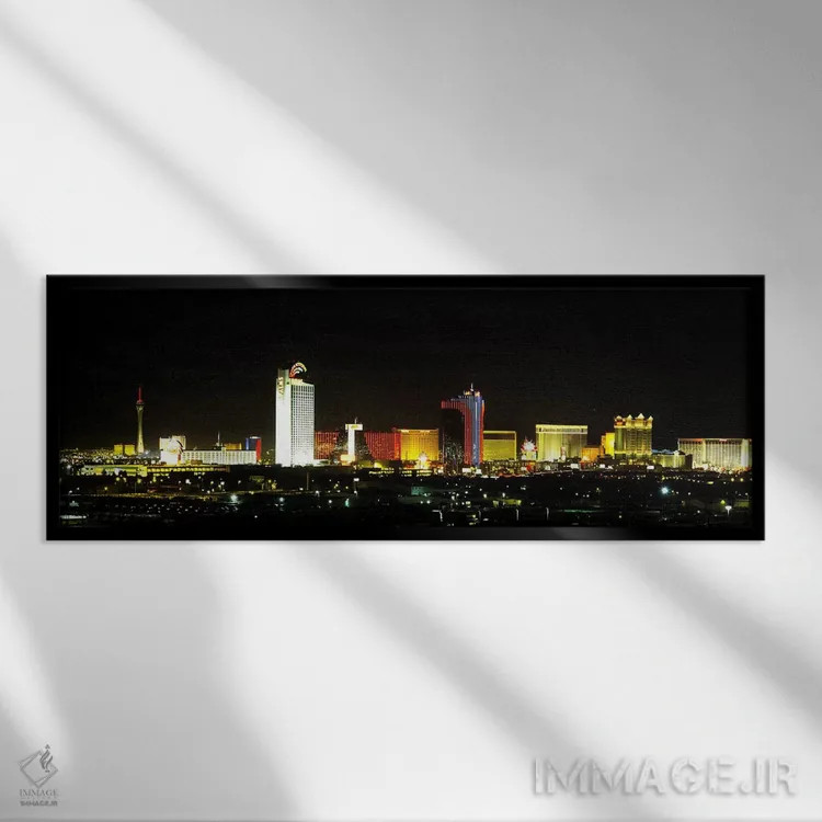 تابلو دکوراتیو Las Vegas, Nevada, USA,ساختمان های نورپردازی شده شبانه… اثر پانورامیک ایمجز - نمای قابدار مشکی