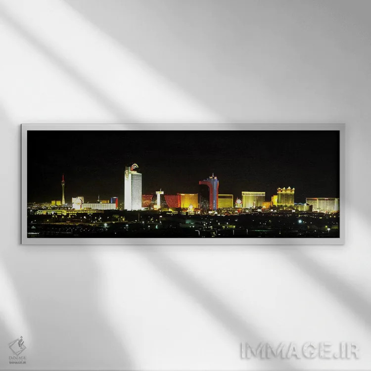 تابلو دکوراتیو Las Vegas, Nevada, USA,ساختمان های نورپردازی شده شبانه… اثر پانورامیک ایمجز - نمای قابدار سفید