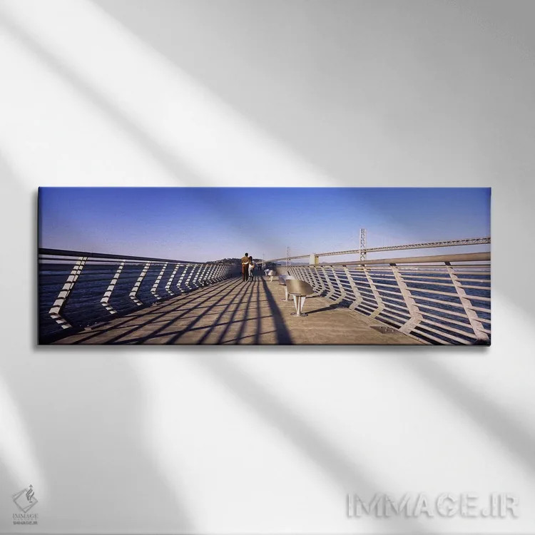 تابلو دکوراتیو Bay Bridge, San Francisco, California, USA,زوجی در حال… اثر پانورامیک ایمجز - نمای روبهرو روی دیوار