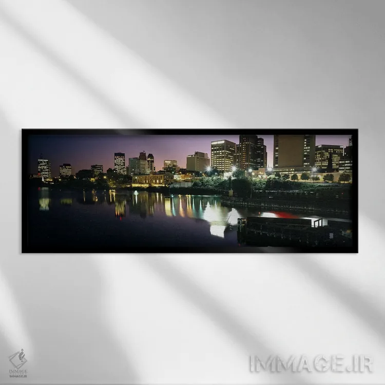 تابلو دکوراتیو New Jersey, USA,شهر روشن در شب، نیوآرک، نیوجرسی، آمریکا اثر پانورامیک ایمجز - نمای قابدار مشکی