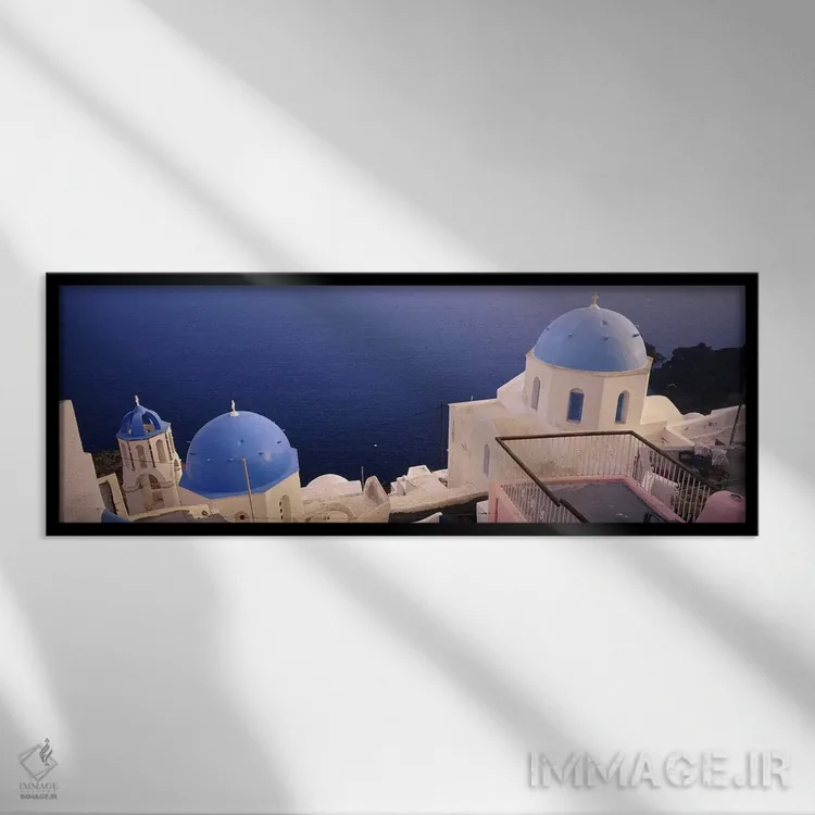 تابلو دکوراتیو Oia, Santorini, Greece,نمای بالا از کلیسای گنبد آبی در… اثر پانورامیک ایمجز - نمای قابدار مشکی