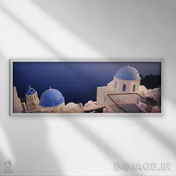 تابلو دکوراتیو Oia, Santorini, Greece,نمای بالا از کلیسای گنبد آبی در… اثر پانورامیک ایمجز - نمای قابدار سفید