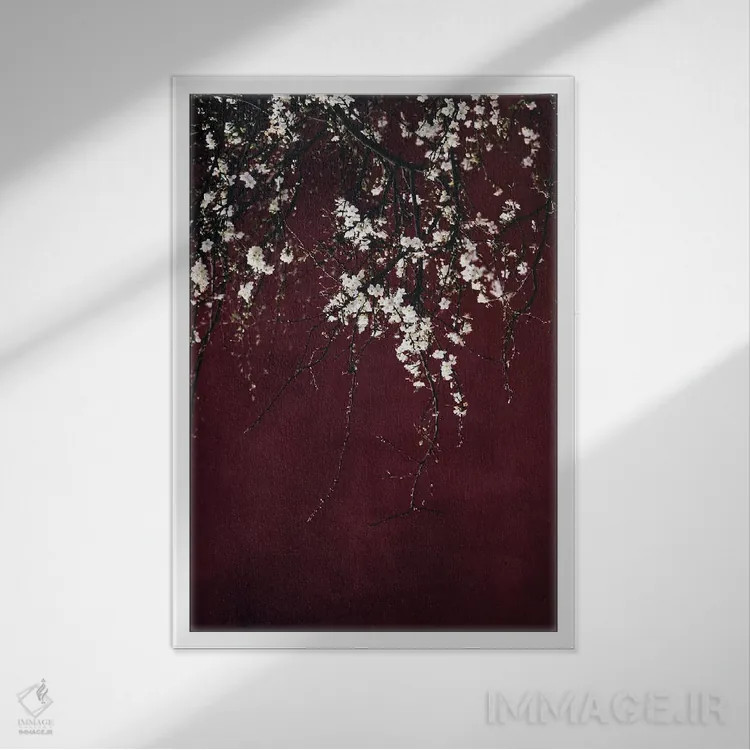 تابلو دکوراتیو شکوفه ها روی زمینه قرمز یاقوتی اثر اینگرید بدوز - نمای قابدار سفید
