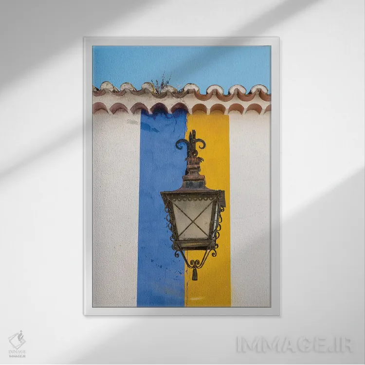 تابلو دکوراتیو Obidos, Portugal,فانوس فلزی آویزان از دیوار رنگی راه راه، اوب… اثر جولی اگرز - نمای قابدار سفید