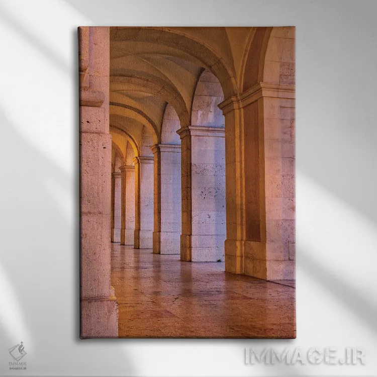 تابلو دکوراتیو Lisbon. Columns Of The Arcade Of Commerce Square With Evening… اثر جولی اگرز - نمای روبهرو روی دیوار