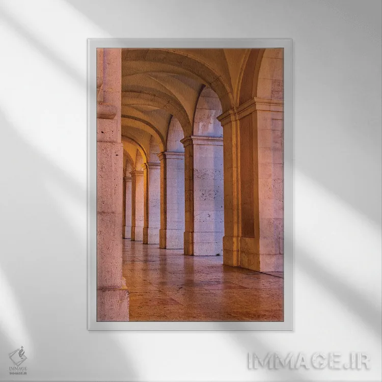 تابلو دکوراتیو Lisbon. Columns Of The Arcade Of Commerce Square With Evening… اثر جولی اگرز - نمای قابدار سفید