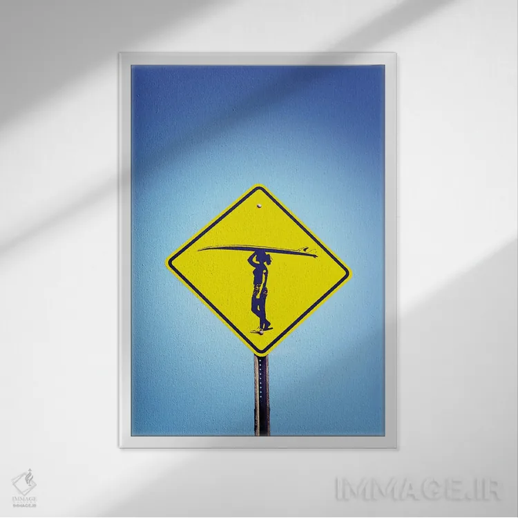 تابلو دکوراتیو دختر موج سوار به موج سواری ادامه بده اثر جوزف اس. جیاکالونه - نمای قابدار سفید