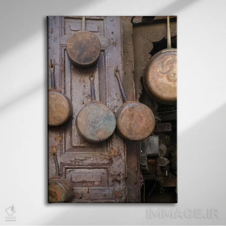 تابلو دکوراتیو Morocco. Antique Copper Pans For Sale In The Medina,فاس… اثر ژولین مک رابرتس - نمای روبهرو روی دیوار