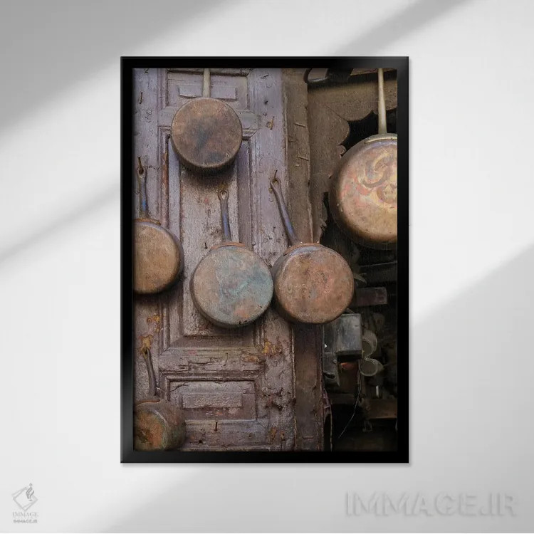 تابلو دکوراتیو Morocco. Antique Copper Pans For Sale In The Medina,فاس… اثر ژولین مک رابرتس - نمای قابدار مشکی