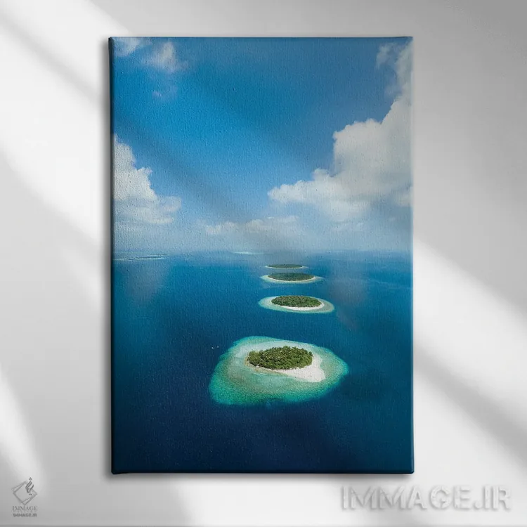 تابلو دکوراتیو نمای هوایی از آتول با در مالدیو اثر یان بکه - نمای روبهرو روی دیوار
