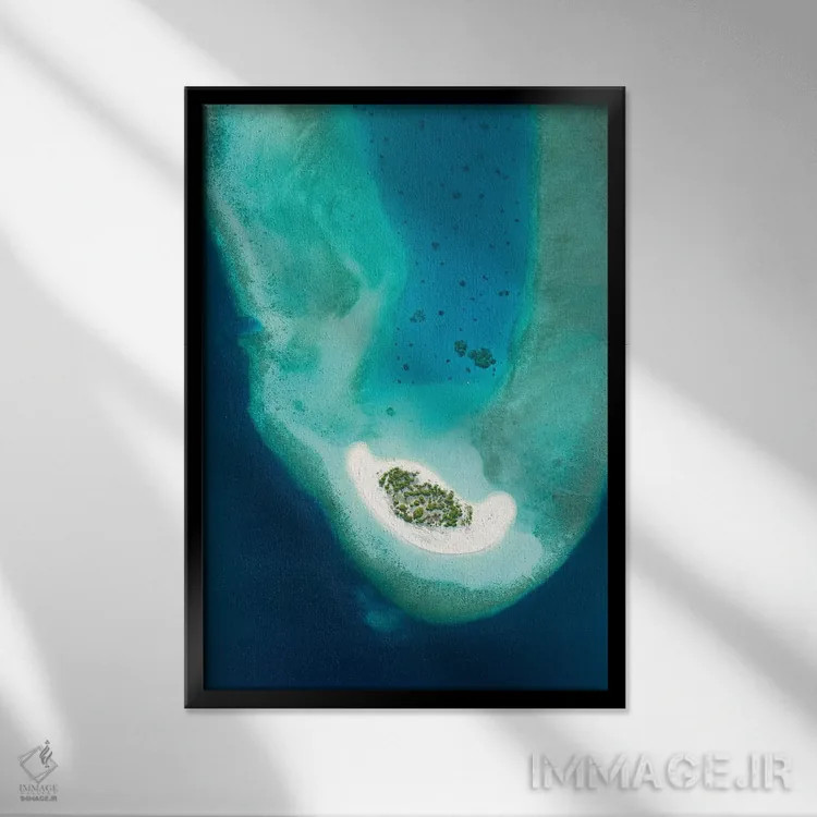 تابلو دکوراتیو نمای هوایی از یک جزیره استوایی کوچک در مالدیو اثر یان بکه - نمای قابدار مشکی