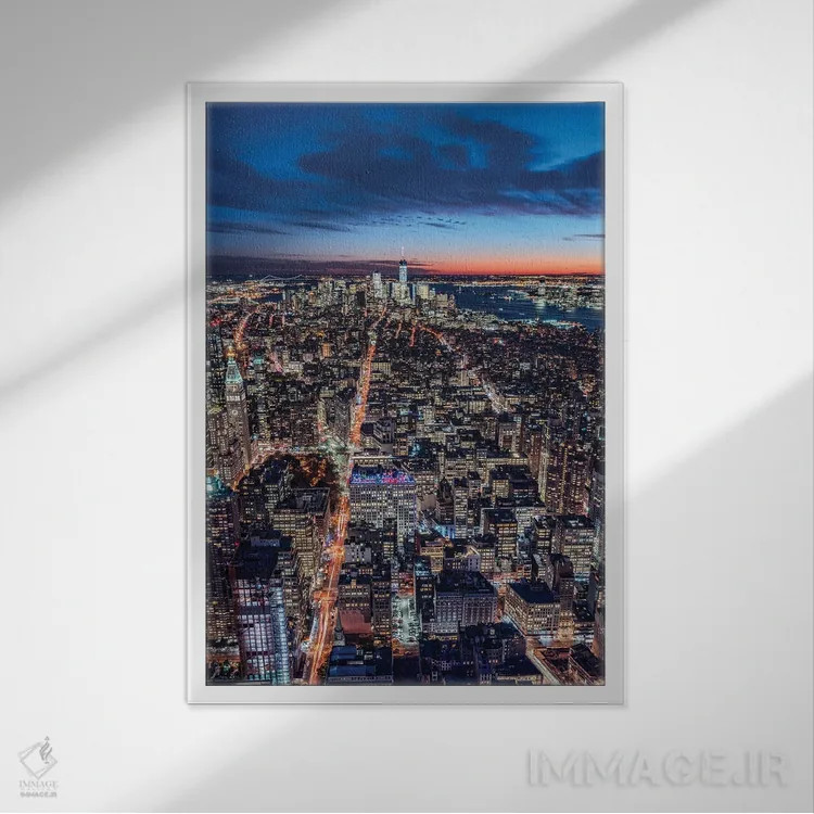 تابلو دکوراتیو New York City, Usa,منظره منهتن جنوبی در شب، نیویورک اثر یان بکه - نمای قابدار سفید