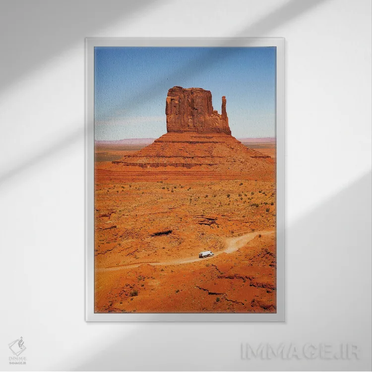 تابلو دکوراتیو Monument Valley,تپه با کامیون، دره یادبود اثر جین ریکس - نمای قابدار سفید